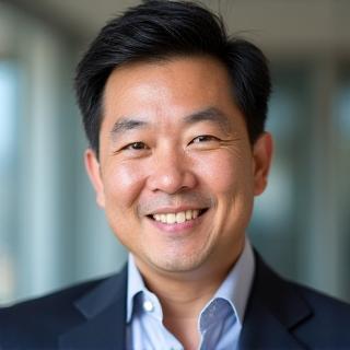 田中健司氏のプロフェッショナルなヘッドショット